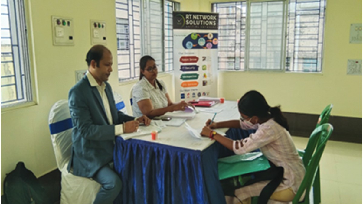 Senior representatives from R T Network Solutions Pvt. Ltd. taking interview