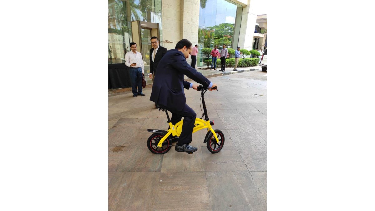 Visitor taking test ride of Electric bicycle at the EV Cycle stall in the Conclave