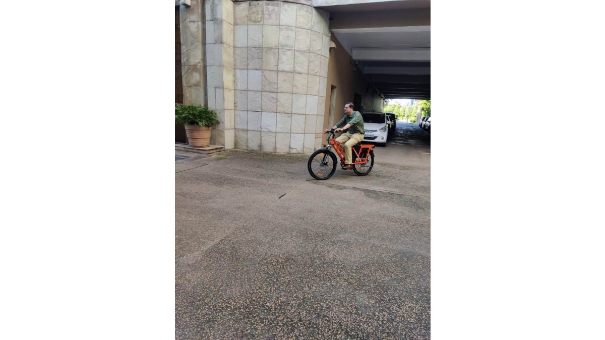 Visitor taking test ride of Electric bicycle at the EV Cycle stall in the Conclave