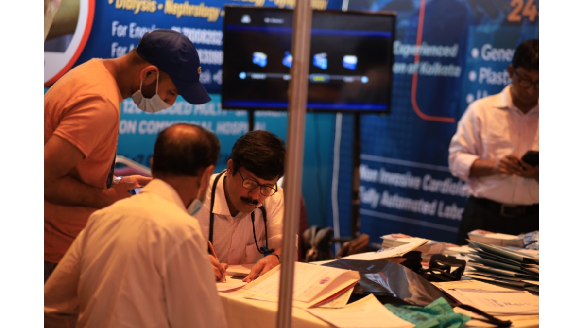 Health Check-up at the Stall of Calcutta Heart Clinic & Hospital : Dr. Biplab Chandra, Consultant Physician, Calcutta Heart Clinic & Hospital advising visitors