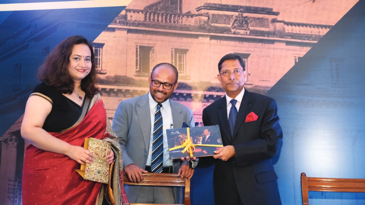 Mr. Subhodip Ghosh, Director General, The Bengal Chamber of Commerce and Industry presenting the memento to Mr. Deb A Mukherjee, President, The Bengal Chamber of Commerce and Industry