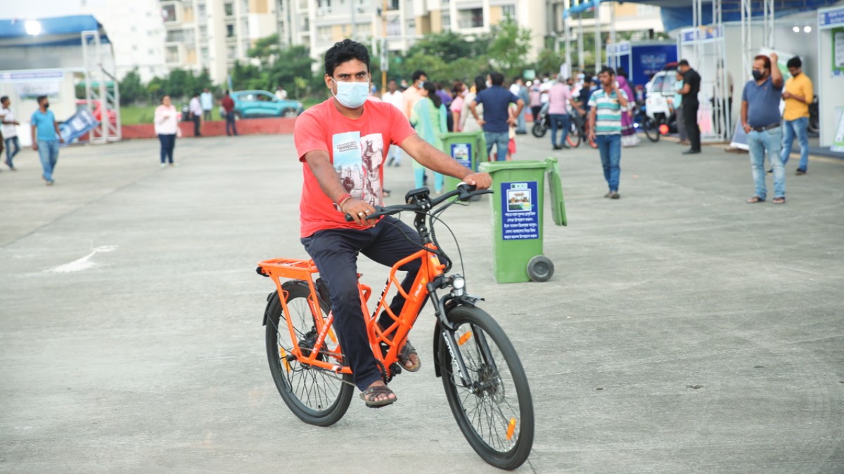 Visitor doing test ride of Electric Bicycle at the EV Carnival