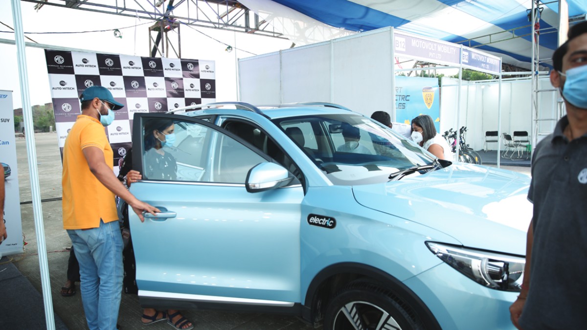 Visitor at the stall for Electric Cars